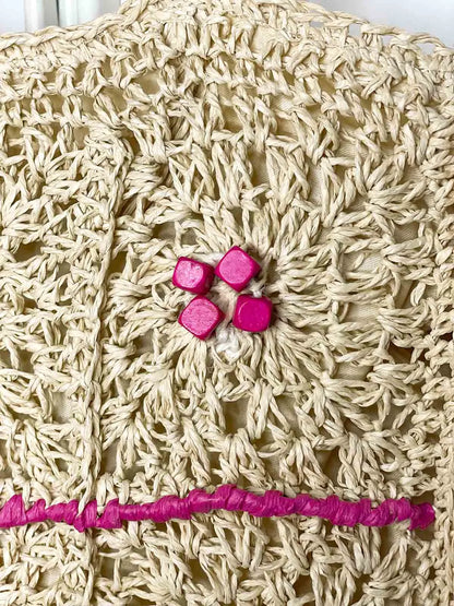 Borsa a spalla in Rafia naturale intrecciata a mano a uncinetto, con Rafia Fucsia e perline in legno è ideale per le tue giornate estive