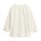 Blusa bianca in mussola di cotone biologico