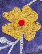 Giacca da donna in velluto viola con ricami floreali